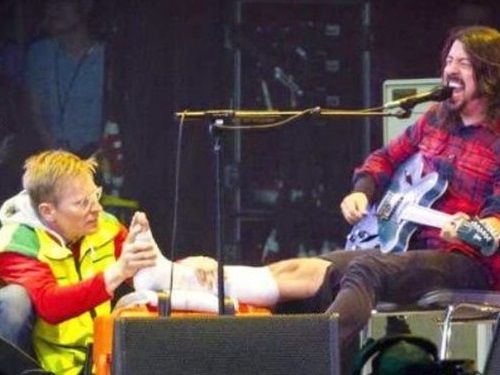 Dave on stage with broken leg.